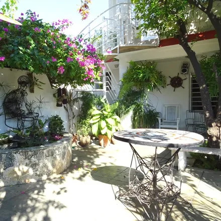 Rent this 4 bed house on Vedado