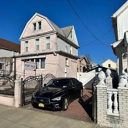 Buy this 4 bed house on 107-27 106th Street in New York, NY 11417