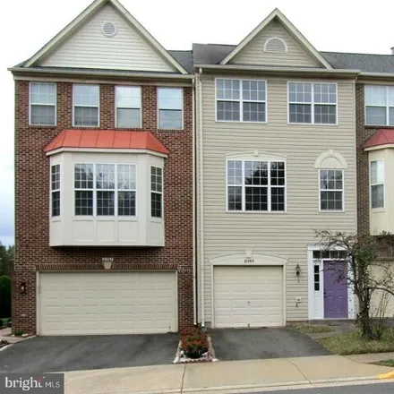 Rent this 3 bed townhouse on 21765 Brondesbury Park Ter in Sterling, Virginia