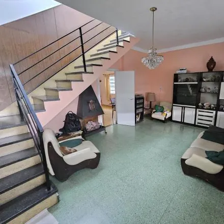 Buy this 3 bed house on Martínez Castro 1385 in Parque Avellaneda, C1406 EZN Buenos Aires