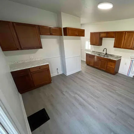 Rent this 3 bed condo on 1022 Williams St