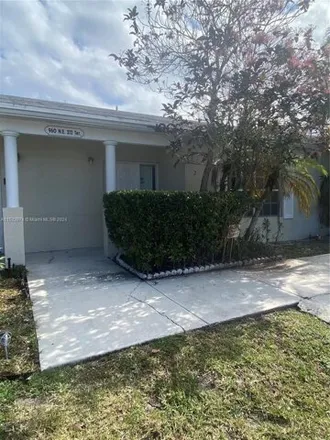 Rent this 2 bed condo on 990 Northeast 212th Terrace in Miami-Dade County, FL 33179