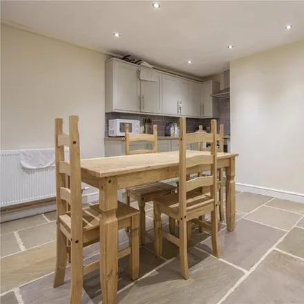Rent this 4 bed townhouse on Pennine Radio in Fitzwilliam Street, Huddersfield