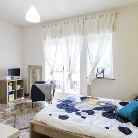 Rent this 3 bed room on Via Pasquale Fornari in 20146 Milan MI, Italy