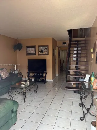 Rent this 2 bed townhouse on 401 West 49th Street in Palm Springs, Hialeah