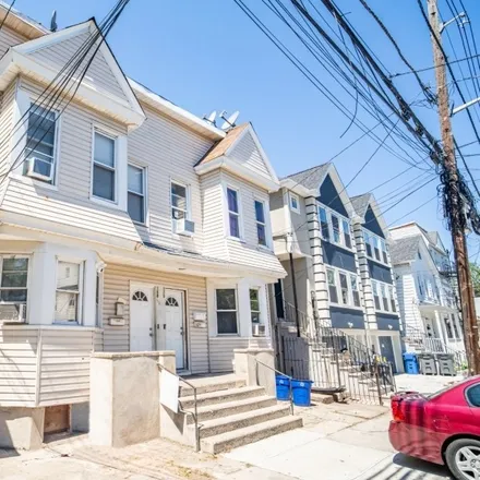 Buy this 8 bed townhouse on 1 2nd Avenue in Newark, NJ 07104