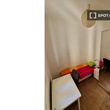 Rent this 6 bed room on Madrid in Calle de Ferraz, 80