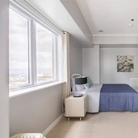 Rent this 3 bed condo on Rosarian Integrated School of Taguig in 43 President Garcia, Taguig