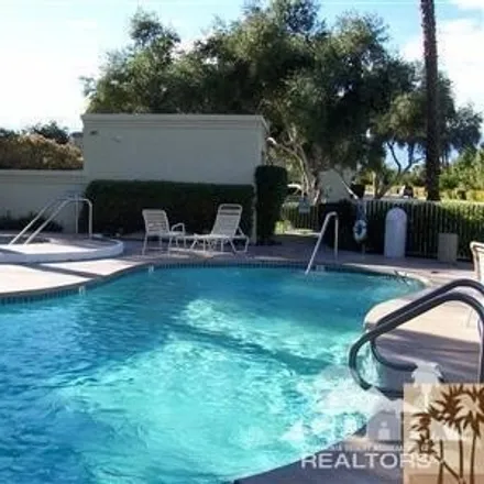 Rent this 2 bed condo on Oasis Country Club Golf Course in Rudy Court, Palm Desert