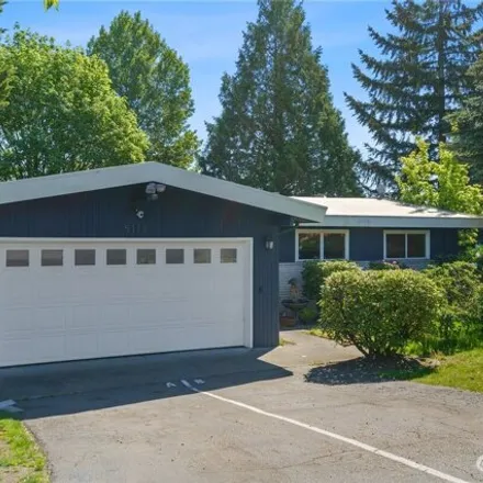 Buy this 6 bed house on 5113 South 163rd Place in Tukwila, WA 98188