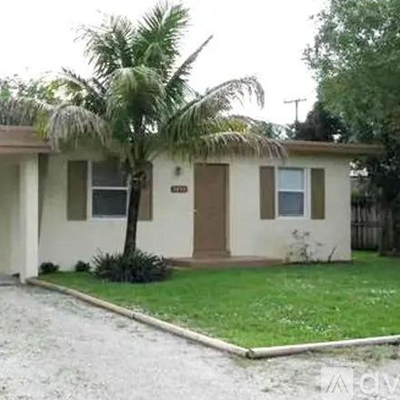 Rent this 2 bed house on 1496 Southwest 30th Terrace Front