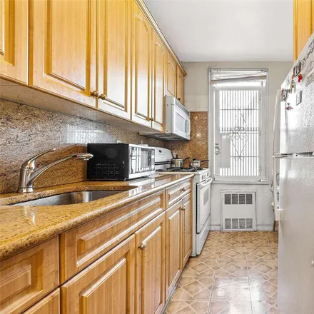 Image 7 - 67-50 Thornton Place, New York, NY 11374, USA - Condo for sale