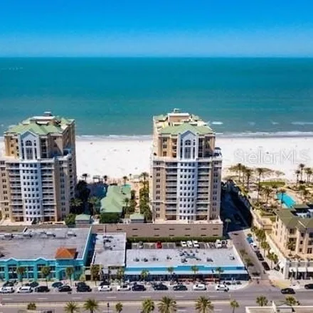 Rent this 4 bed condo on Mandalay Beach Club in San Marco Street, Clearwater Beach