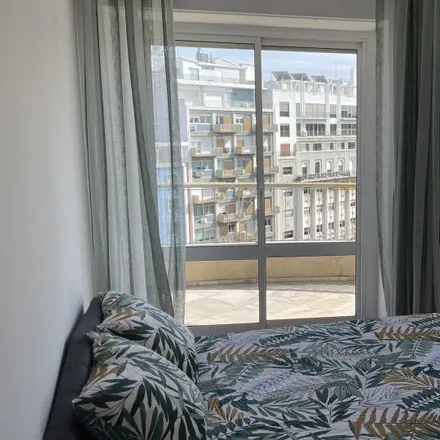 Rent this 6 bed room on Avenida Visconde de Valmor 35 in 1050-240 Lisbon, Portugal