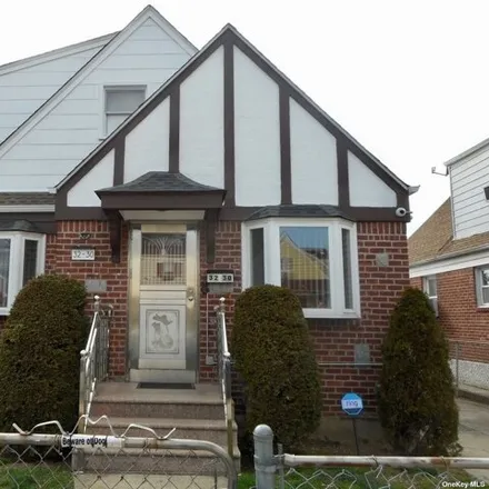 Buy this 4 bed house on 32-30 147th Place in New York, NY 11354