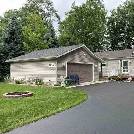 Buy this 3 bed house on 6814 S Forest Lake Dr in Alger, Michigan