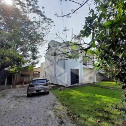 Rent this 3 bed house on Rua dos Laranjais in Morro das Pedras, Florianópolis - SC