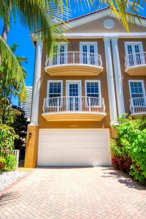 Buy this 4 bed townhouse on 3907 Northeast 170th Street in Eastern Shores, North Miami Beach
