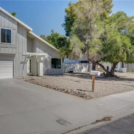 Rent this 4 bed house on 3558 El Camino Road in Spring Valley, NV 89103