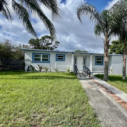 Image 1 - 128 SE Prima Vista Blvd, Port Saint Lucie, Florida, 34983 - House for rent