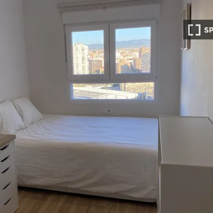 Rent this 4 bed room on Carrer de Ramón Gordillo in 1, 46021 Valencia