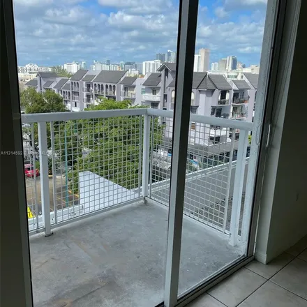 Rent this 2 bed apartment on 900 Southwest 8th Street in Latin Quarter, Miami