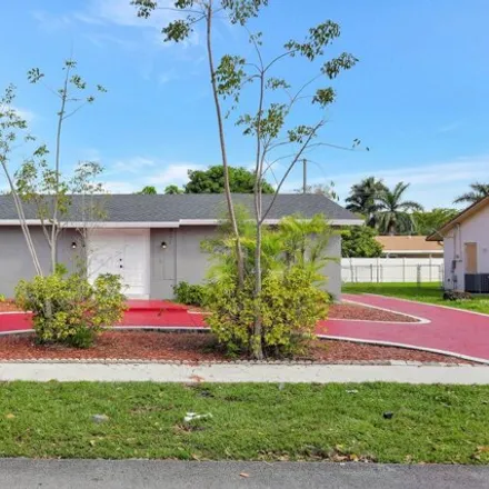Rent this 3 bed house on 8223 Northwest 45th Court in Lauderhill, FL 33351