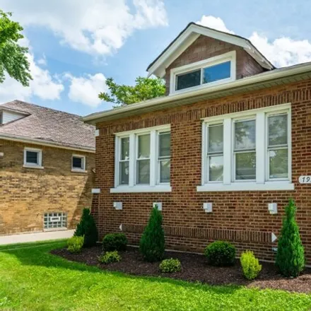 Buy this 3 bed house on 7933 South Avalon Avenue in Chicago, IL 60619