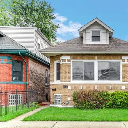 Buy this 4 bed house on 8934 S Marshfield Ave in Chicago, Illinois