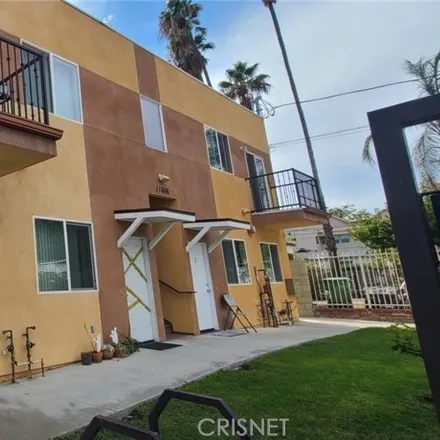 Rent this 3 bed apartment on 11589 Hamlin Street in Los Angeles, CA 91606