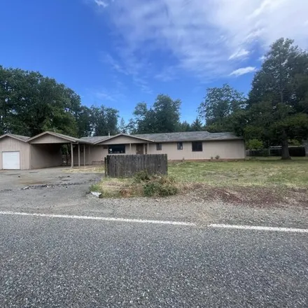 Buy this 3 bed house on 222 Shadywood Dr in Cave Junction, Oregon