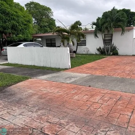 Rent this 4 bed house on 1745 NW 18th St in Fort Lauderdale, Florida