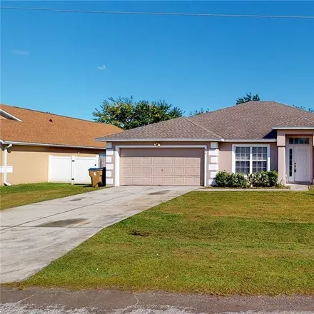 Rent this 4 bed house on 652 Delmonte Court South in Poinciana, FL 34758