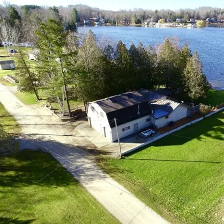 Buy this 2 bed house on 9345 Arnold Creek Road in Lincoln Township, MI 49677
