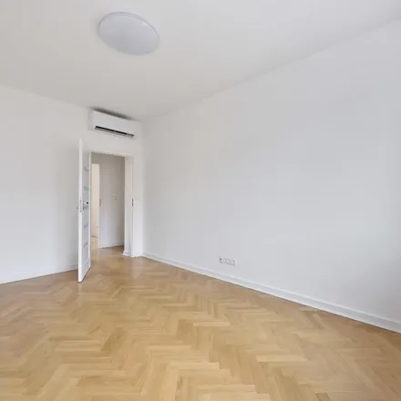 Rent this 2 bed apartment on Marshal Street in 00-005 Warsaw, Poland