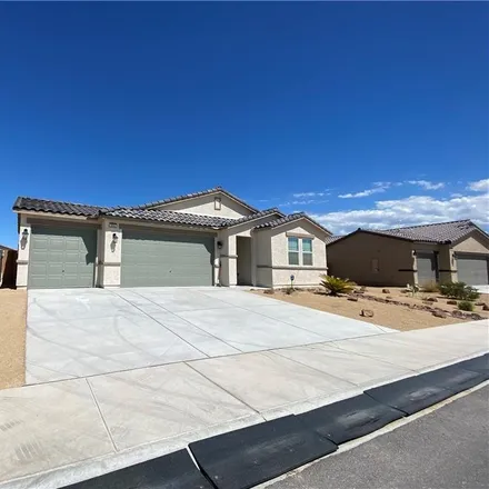 Rent this 3 bed house on 6153 Mountain Falls Boulevard in Manse, Pahrump