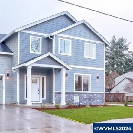 Buy this 4 bed house on 1565 Griswold Avenue Northeast in Keizer, OR 97313