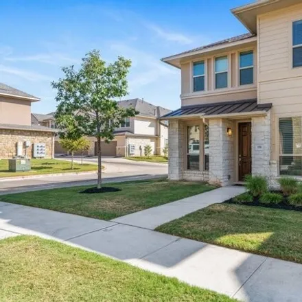 Rent this 4 bed townhouse on Lakeline Boulevard in Austin, TX 78717