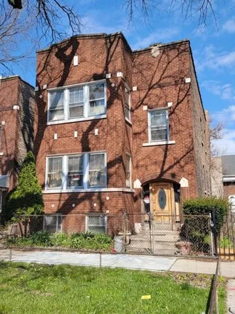 Buy this 6 bed house on 3818 West Huron Street in Chicago, IL 60624