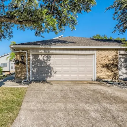 Buy this 3 bed townhouse on 2135 Country Villa Drive in Carrollton, TX 75006