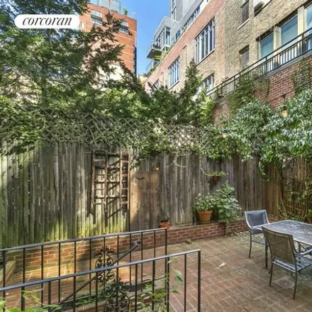 Rent this 3 bed townhouse on 233 West 16th Street in New York, NY 10011