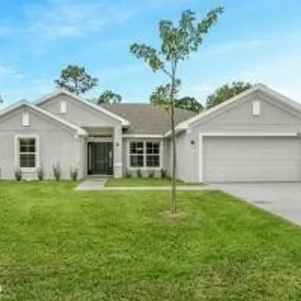 Buy this 4 bed house on 2301 Garvin Avenue in Palm Bay, FL 32908