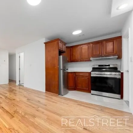 Rent this 2 bed townhouse on 68 Covert Street in New York, NY 11207