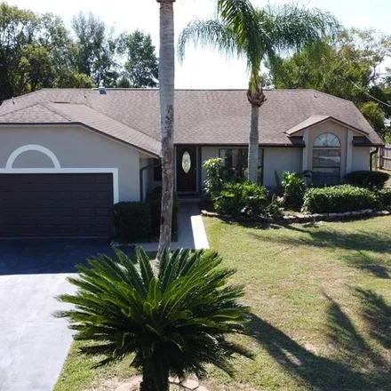 Buy this 3 bed house on 899 Tulip Street in Deltona, FL 32725