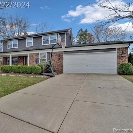 Buy this 4 bed house on 3235 Tammaron Drive in Rochester Hills, MI 48309