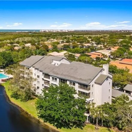 Buy this 3 bed condo on Arbor Lake Drive in Collier County, FL 34110