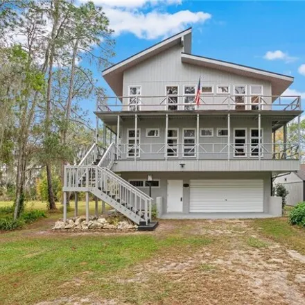 Buy this 4 bed house on 7369 Circle Drive in Lady Lake, FL