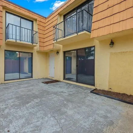 Rent this 2 bed townhouse on 1774 Park Meadows Drive in Villas, FL 33907