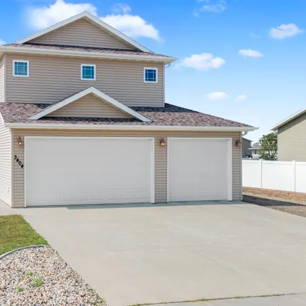 Buy this 4 bed house on 1401 13th Avenue Southeast in Minot, ND 58701