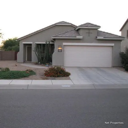 Rent this 3 bed house on 11398 West Harvester Drive in Marana, AZ 85653